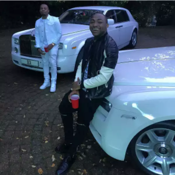 Photo: Davido & Olamide Show Off Their Double White Rolls-Royce As They Arrive Nigeria